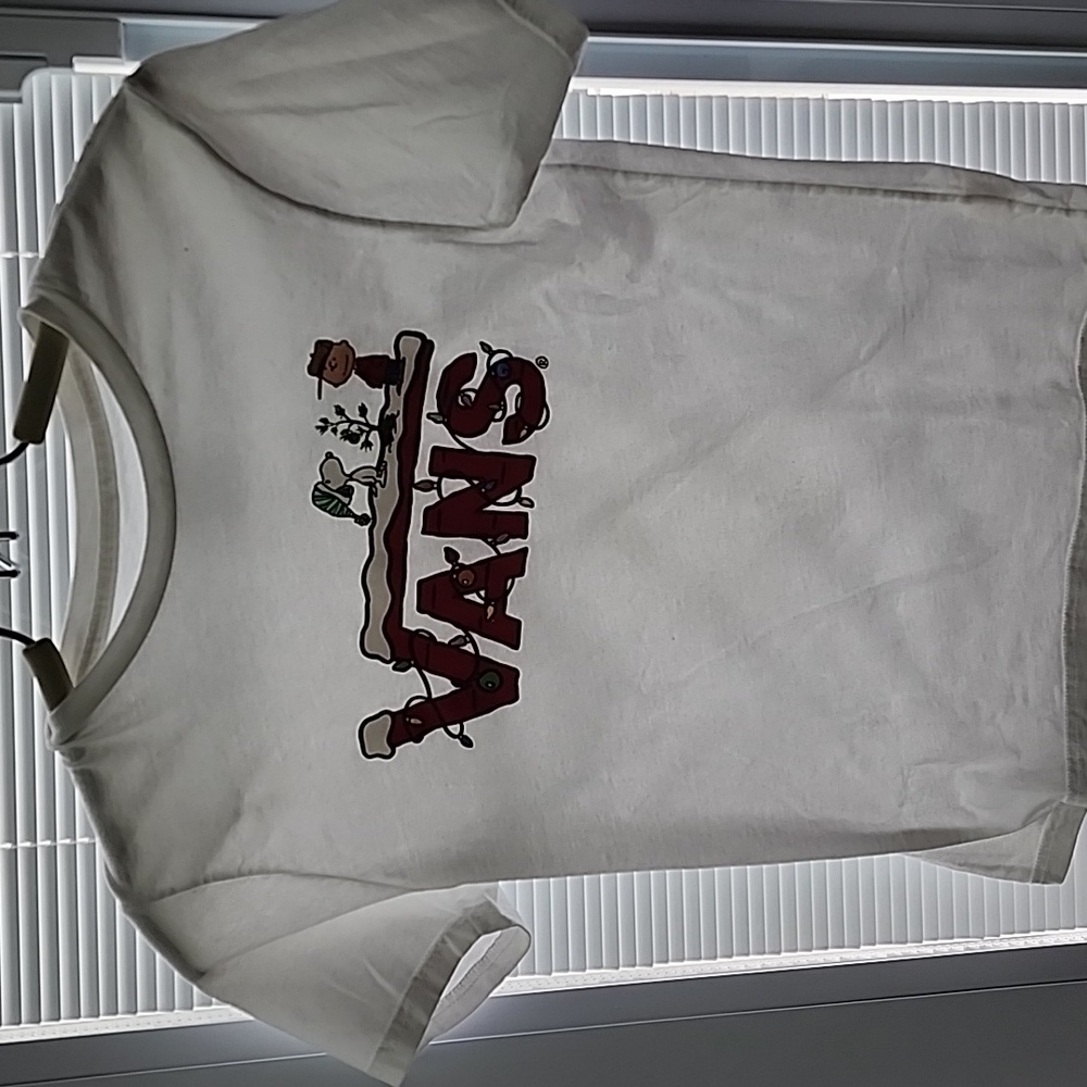 Vans peanuts white  t shirt size small for a youth.